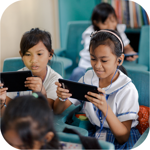 Children studying on tablets